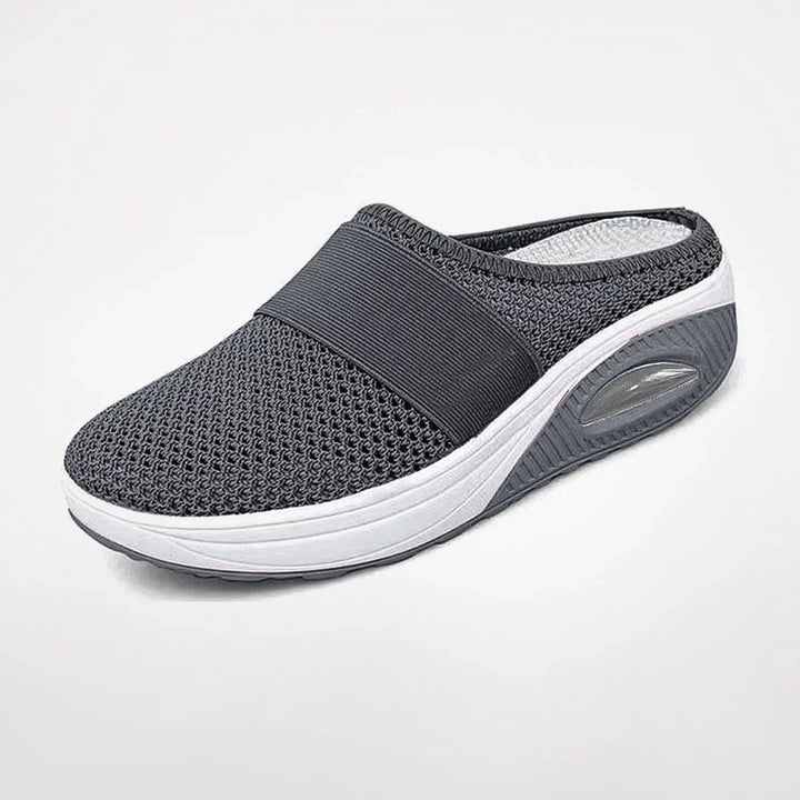Experience superior foot support with women's orthopedic slippers. Stylish, comfortable, and non-slip everyday wear.