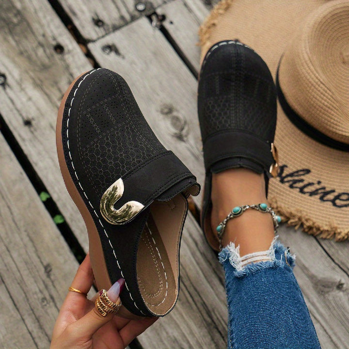 Women's orthopedic slippers with arch support & non-slip sole. Ideal for indoor foot comfort & relief.