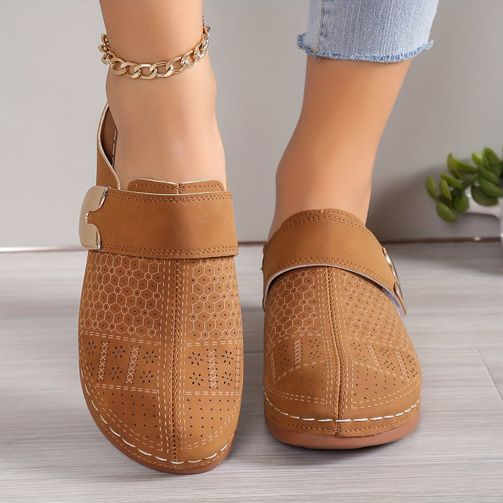 Relieve foot pain with women's orthopedic arch support slippers. Features a comfortable, non-slip indoor sole.