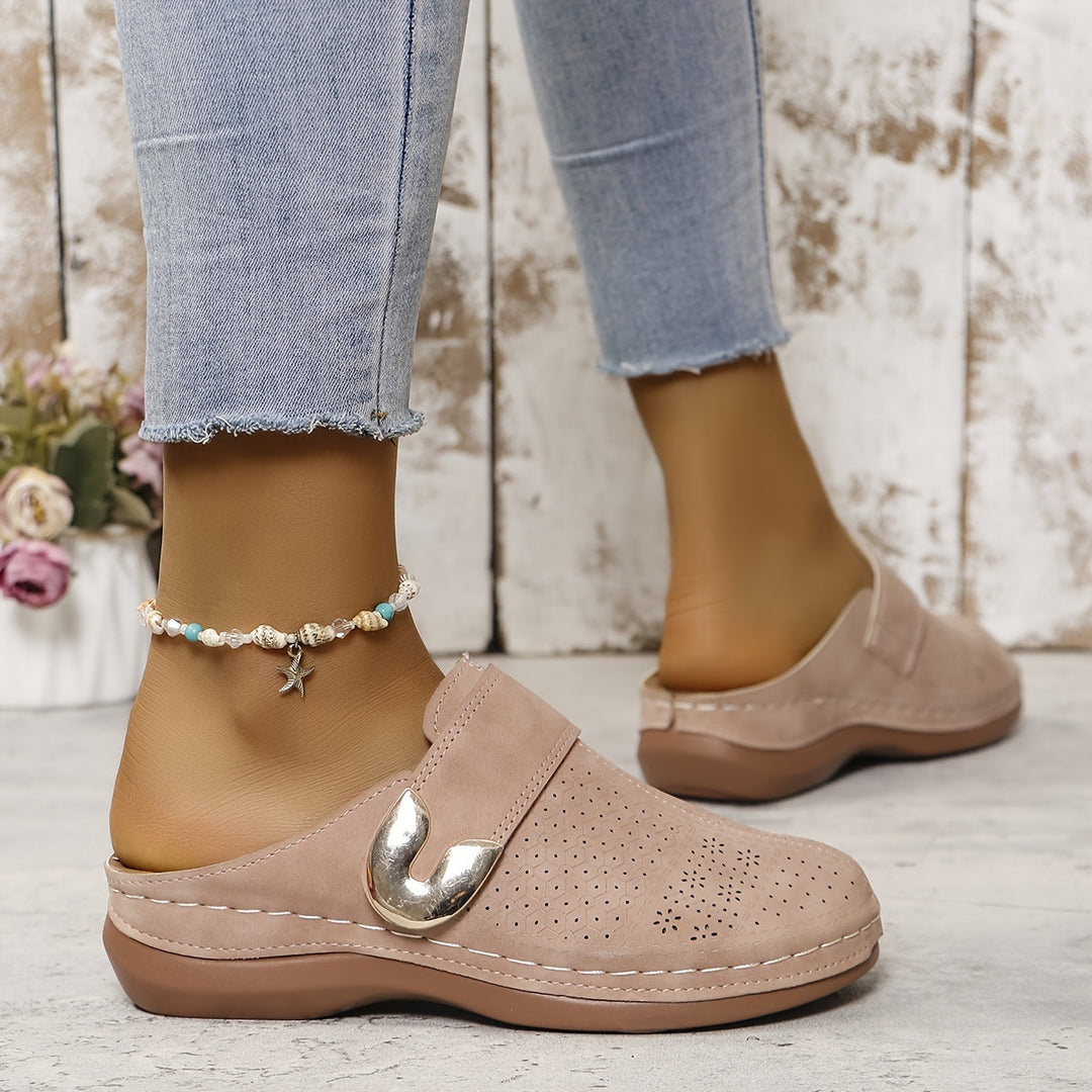 Plush women's orthopedic slippers, offering excellent arch support & a non-slip sole for ultimate indoor comfort.