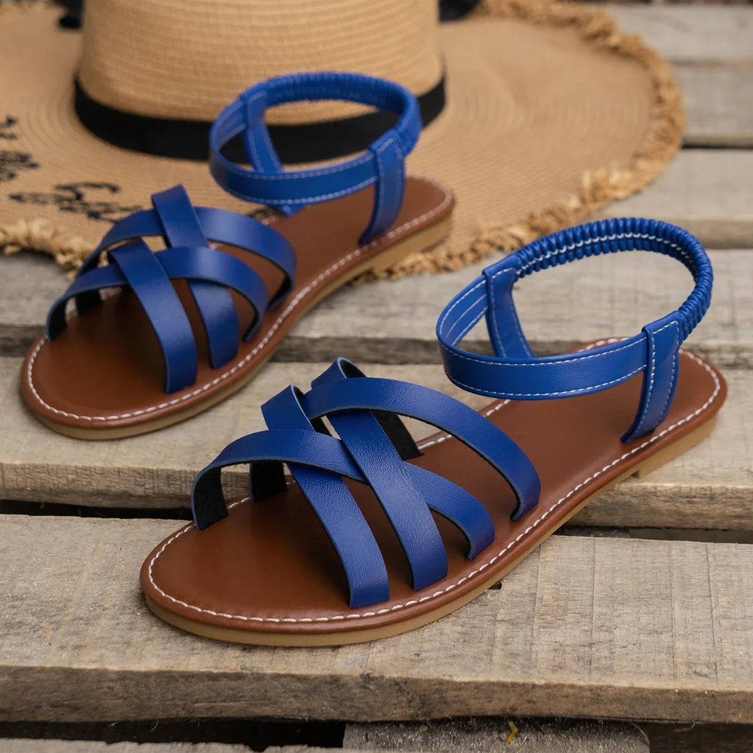 Pair of women's orthopedic spring sandals, showcasing adjustable straps, open toe, and comfort features.