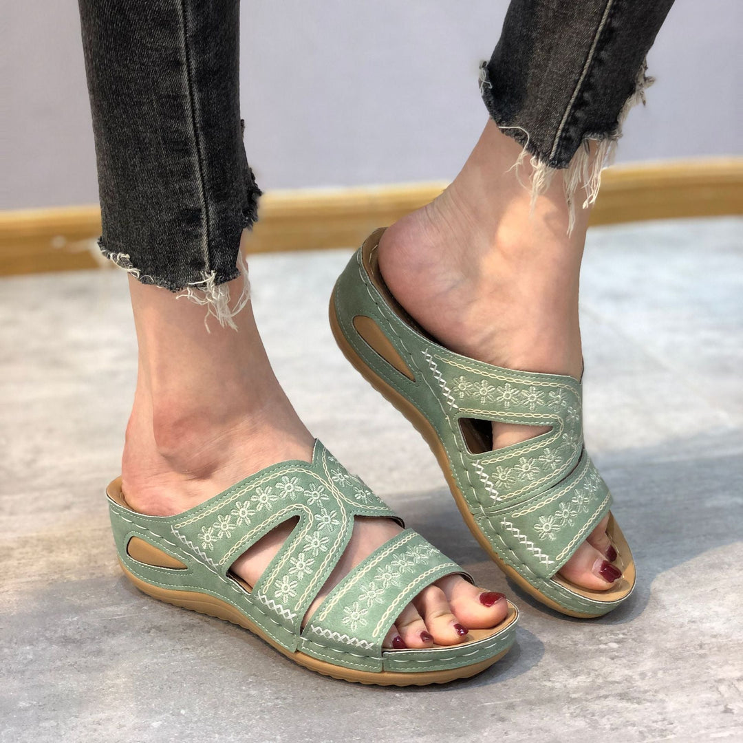 Collection of various colored women's orthopedic summer sandals for ultimate comfort