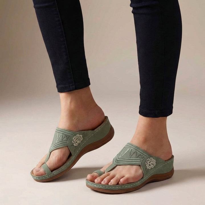 Stylish women's T-strap wedge sandals, ideal summer footwear with orthopedic support.