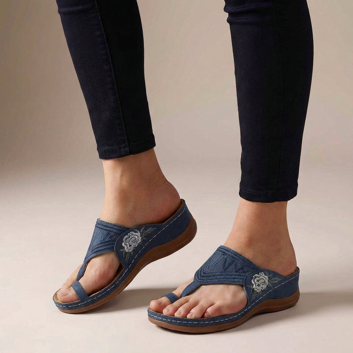 Casual open-toe women's wedge sandals with T-strap design, offering orthopedic comfort.