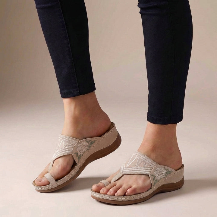 Orthopedic T-strap wedge comfort sandals for women, great for casual, everyday summer wear.