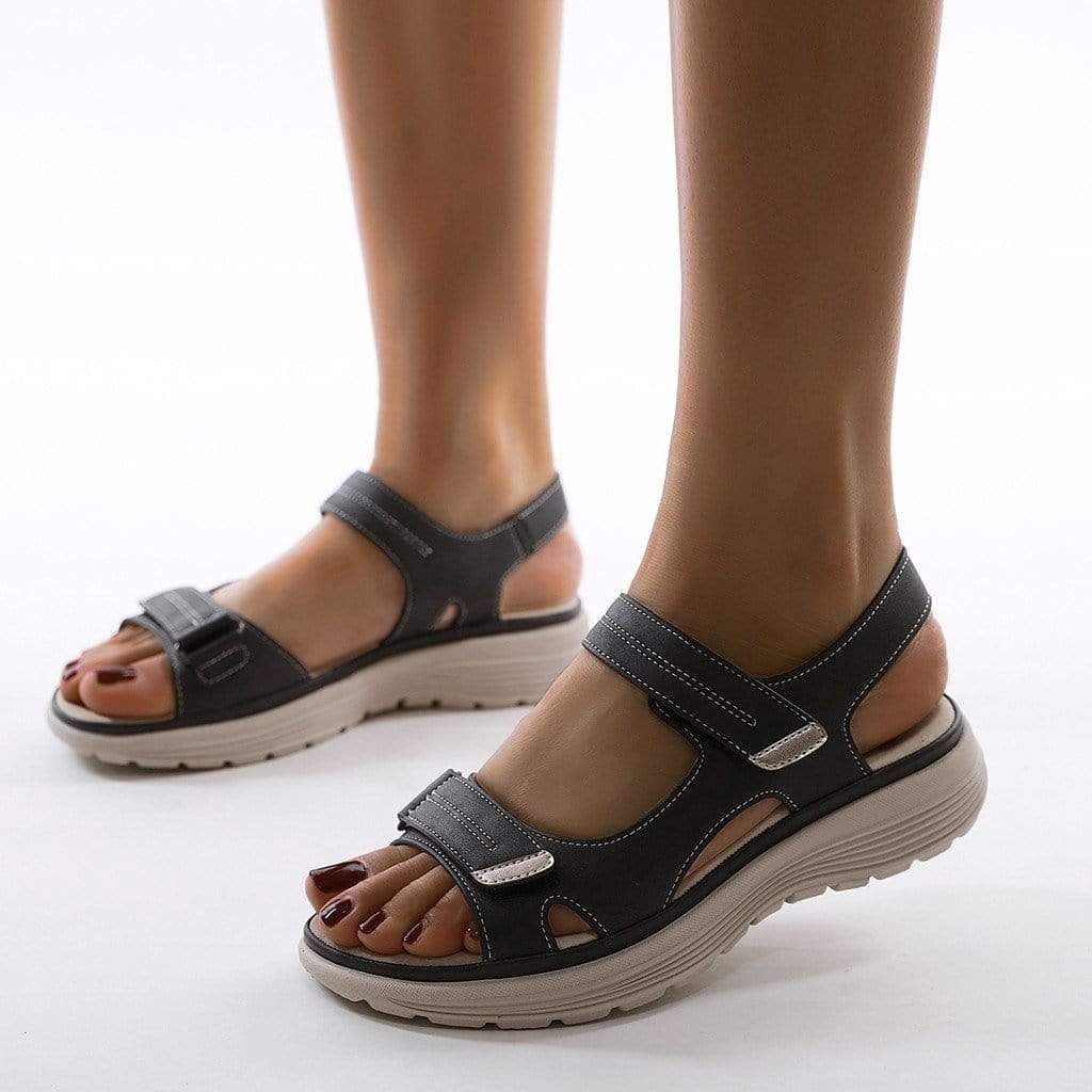 Women's orthopedic walking sandals with adjustable straps & arch support for comfortable summer travel.