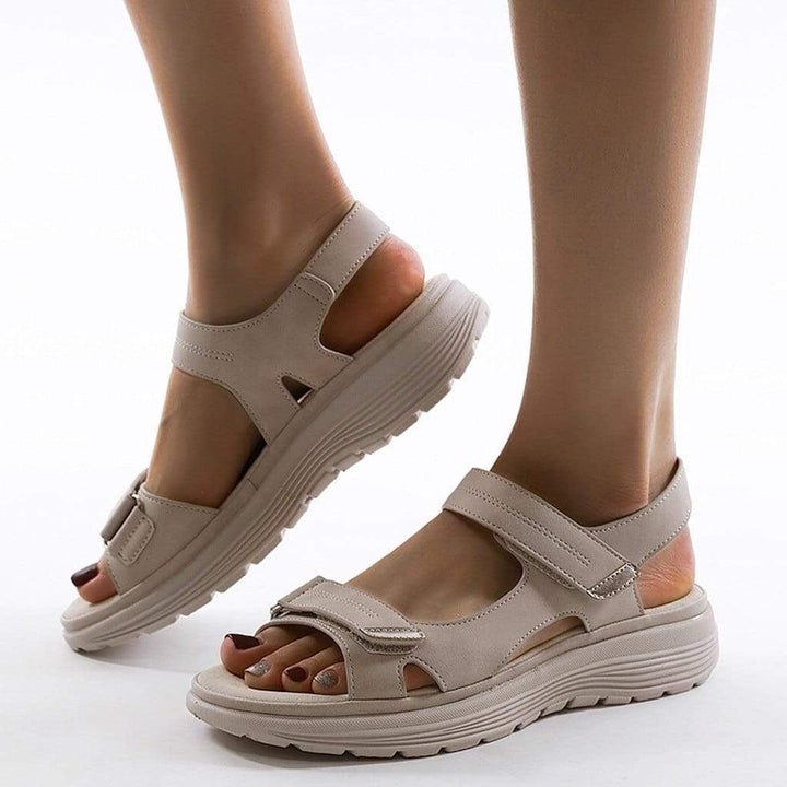 Adjustable women's orthopedic sandals with arch support for comfortable walking; ideal lightweight summer footwear.