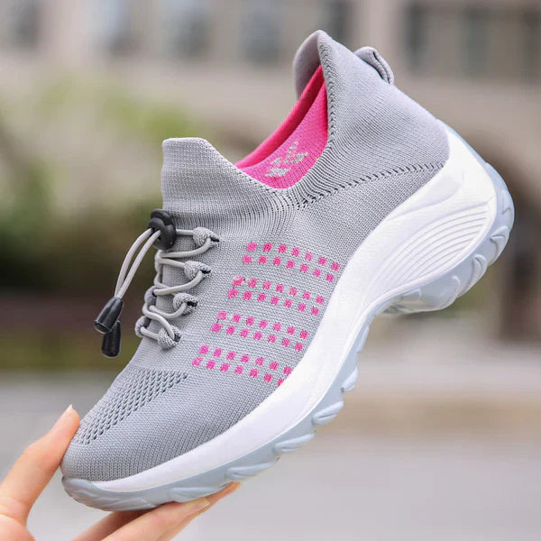 Modern women's orthotic footwear, combining sleek design with plantar fasciitis relief & comfort.