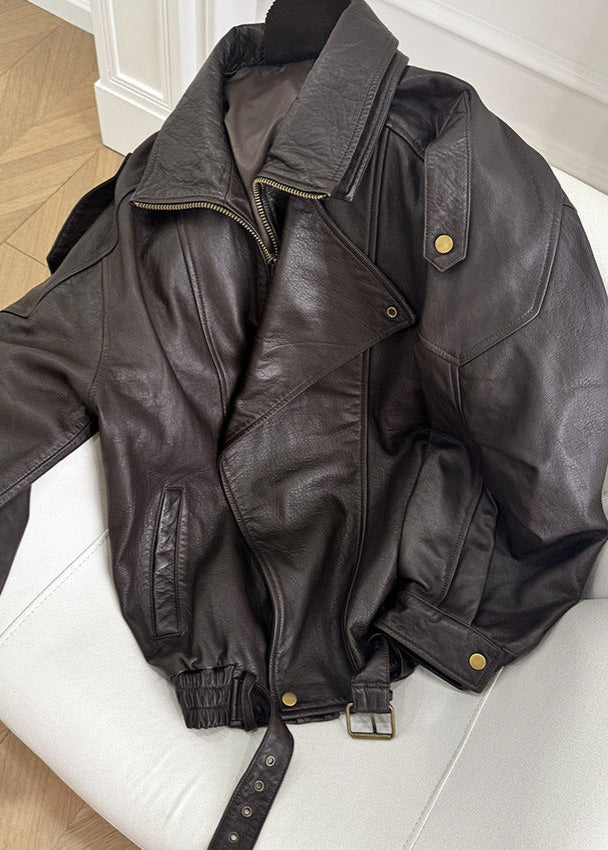 Retro-inspired women's brown leather bomber jacket, an essential fall fashion outerwear piece