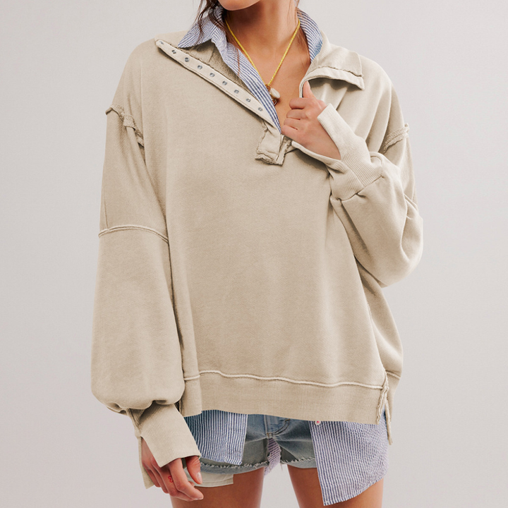 Relaxed fit women's oversized Henley pullover. Long sleeve casual top, ideal for comfortable everyday fashion.