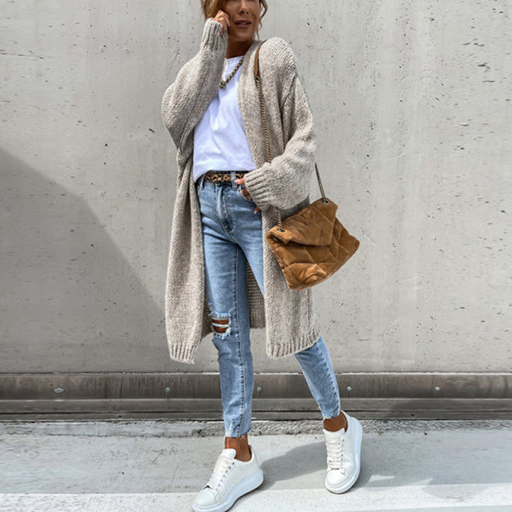 Women's oversized knit duster cardigan in a long, flowing silhouette, perfect for stylish layering.