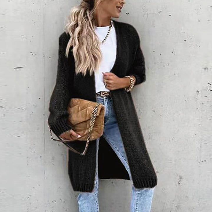 Elegant women's oversized long knit duster cardigan, adding a relaxed yet stylish touch to any outfit.