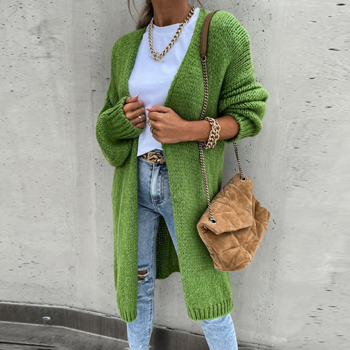 Warm women's knit duster cardigan, oversized long design, perfect for autumn and winter layering.