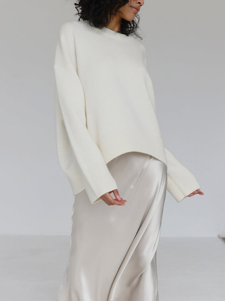 Warm women's knit pullover sweater, long sleeve oversized design, round neckline