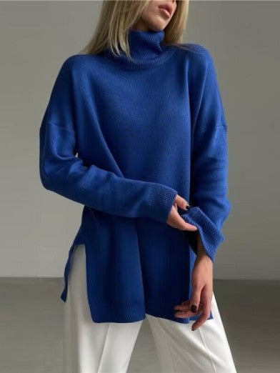 Stylish women's long oversized knit turtleneck sweater featuring a chic side slit. Great fall & winter fashion statement.
