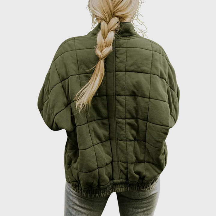 Back view of a women's oversized mid-season padded coat, versatile casual jacket