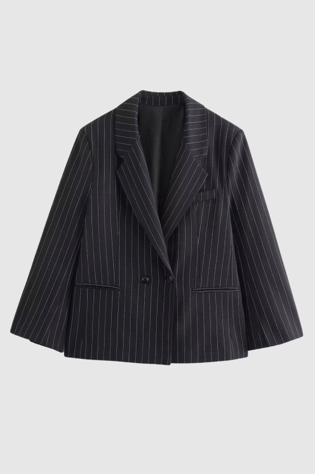 Women's oversized pinstripe blazer, double-breasted, perfect for elegant smart casual or professional wear.