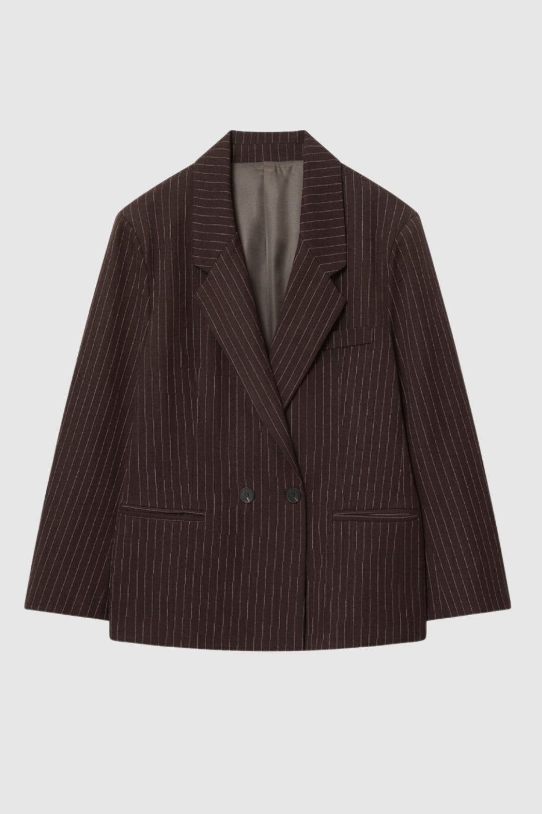 Sophisticated women's oversized pinstripe blazer. A versatile, double-breasted jacket for office or smart casual.