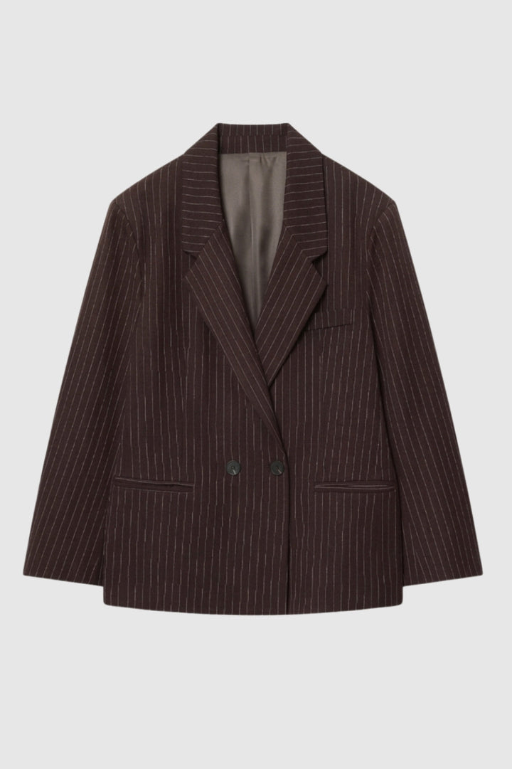 Sophisticated women's oversized pinstripe blazer. A versatile, double-breasted jacket for office or smart casual.