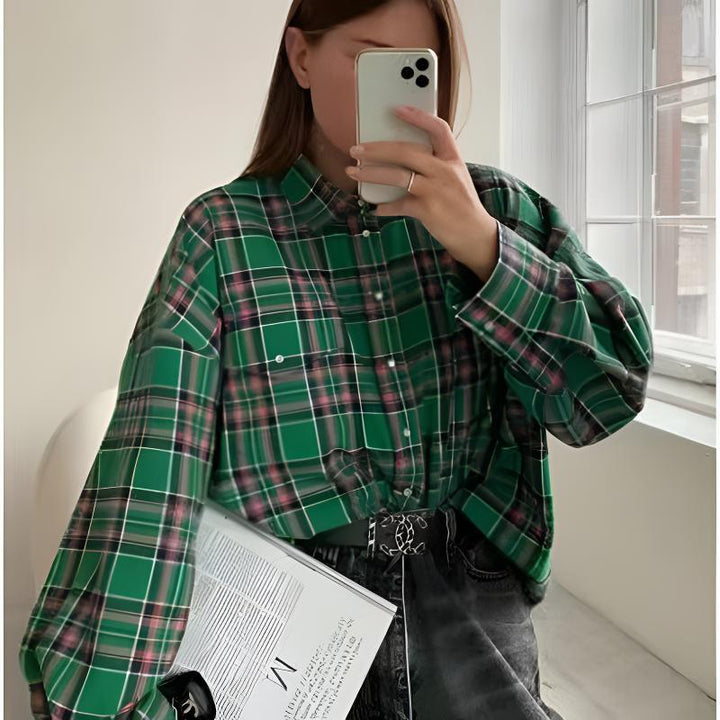 Relaxed fit women's plaid shirt blouse. Comfortable oversized long sleeve top, perfect for casual stylish looks.