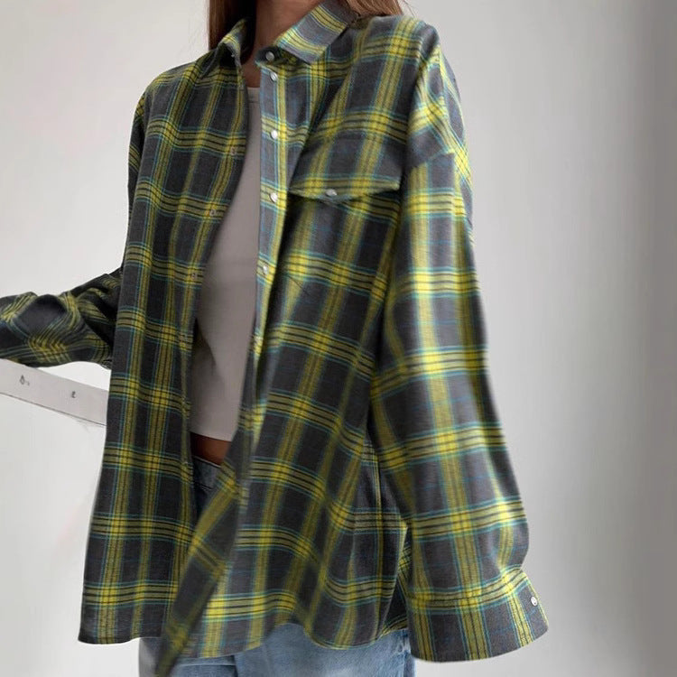 Women's stylish oversized plaid blouse. Comfortable long sleeve button-down shirt, great for casual everyday fashion.
