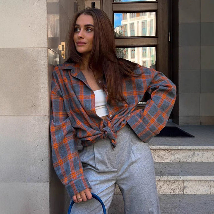 Everyday wear women's plaid oversized shirt. Chic long sleeve button-down blouse for comfortable, stylish fashion.