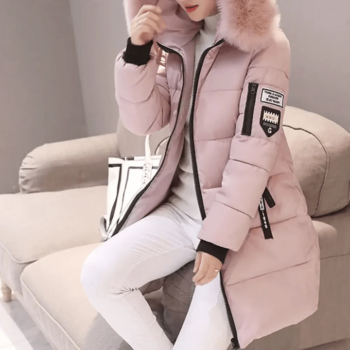 Women's oversized puffer jacket with luxurious faux fur hood, perfect for warm winter fashion & cold weather.