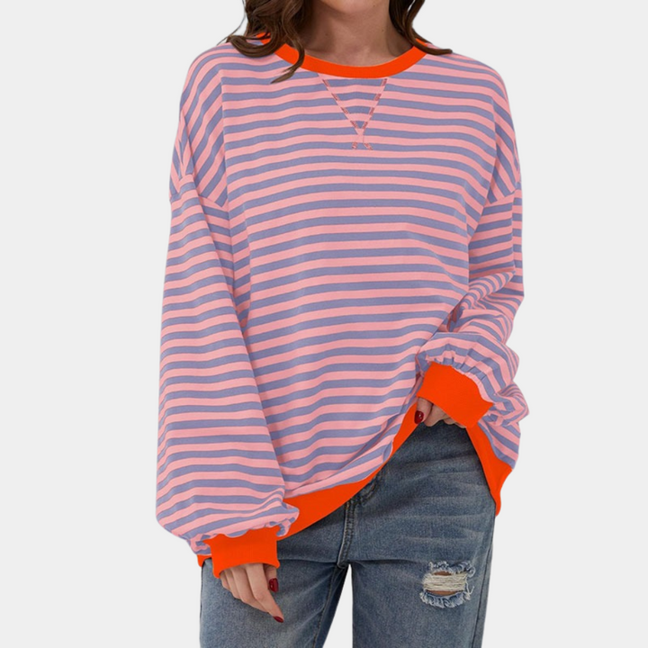 Relaxed fit women's striped long sleeve t-shirt in an oversized style. Ideal casual top for comfort and everyday wear.