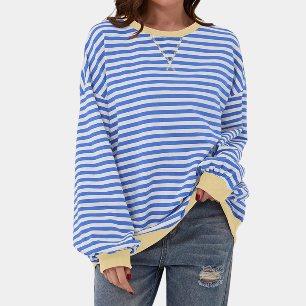 Casual women's oversized striped long sleeve tee, showcasing a relaxed silhouette. Everyday comfort in a stylish design.