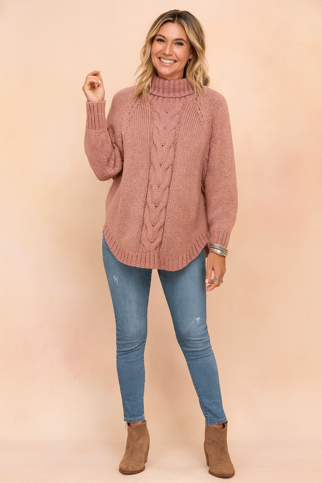 Relaxed fit women's oversized turtleneck sweater, a fashionable and warm pullover for casual wear.