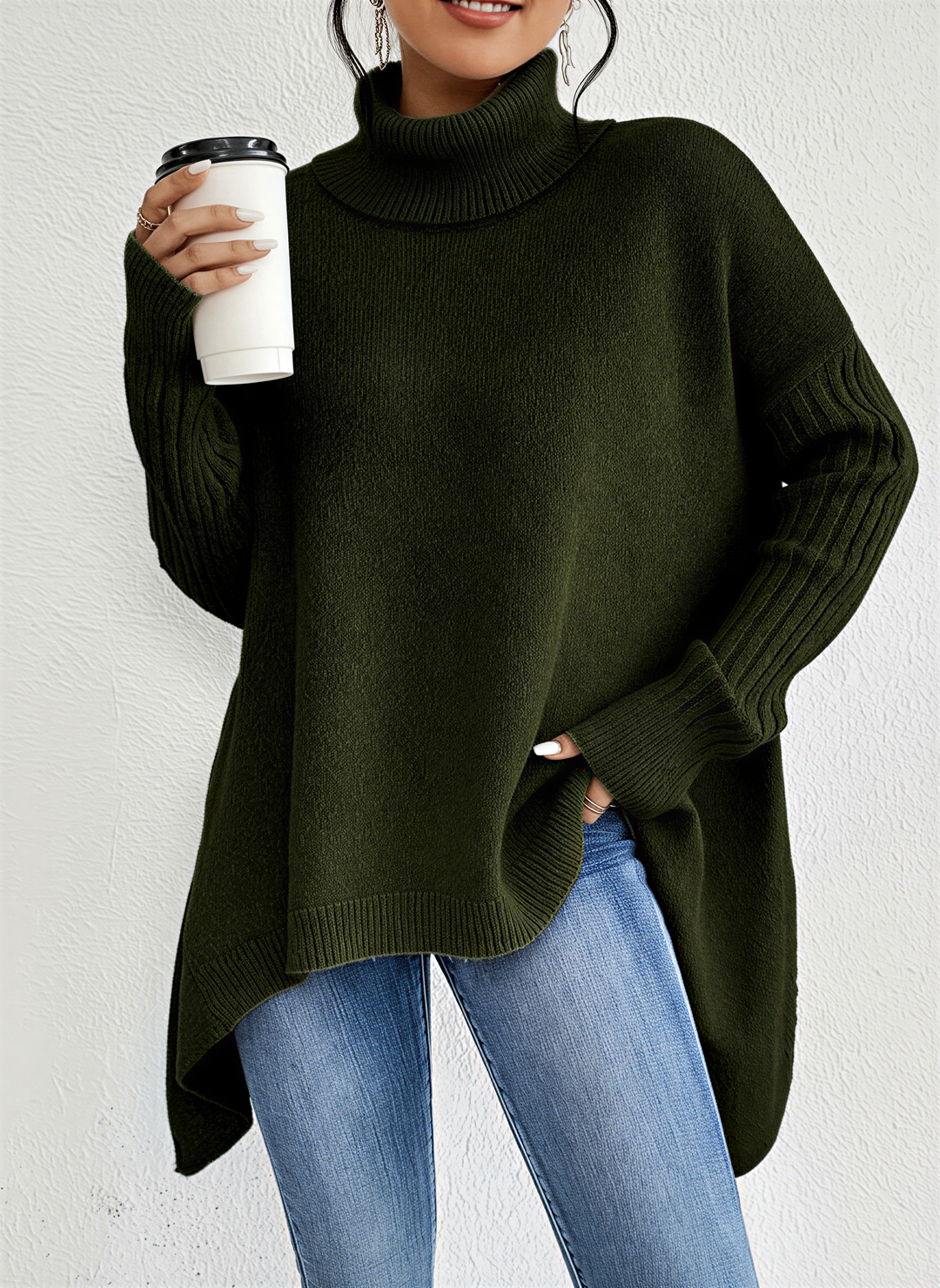 Stylish women's oversized turtleneck top with a prominent pocket, a must-have for spring casual wear.