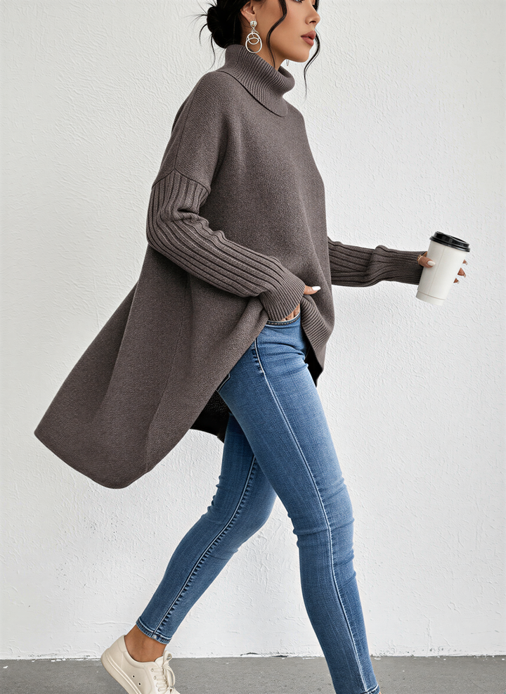 Fashionable women's oversized long-sleeve turtleneck sweater with pocket detail, versatile casual wear.