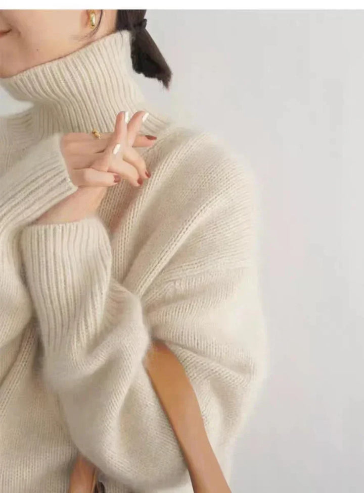White oversized turtleneck sweater for women, a comfortable and essential summer layering piece
