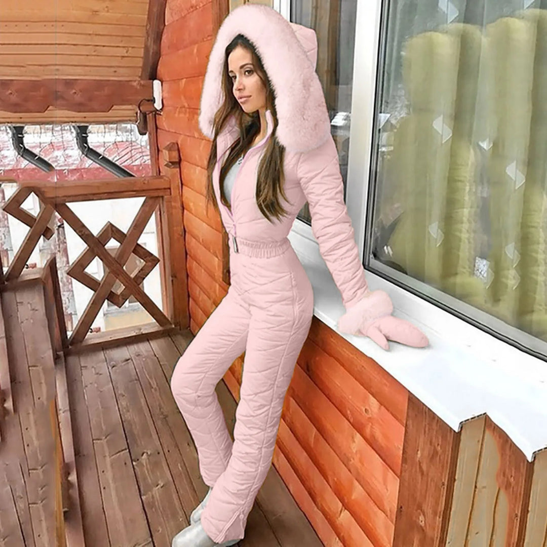 Chic women's padded winter suit. Stylish full snow outfit for outdoor activities & cold weather fashion.