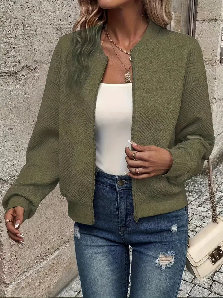 Soft knitwear: women's full zip cardigan, showcasing its comfortable fit and appealing pattern