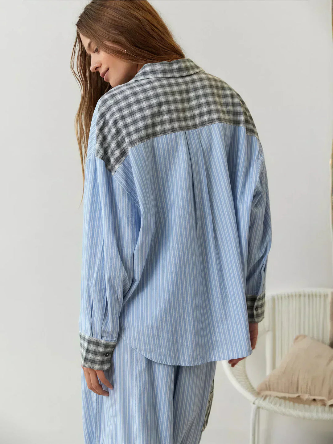 Front view of a women's casual pink and blue plaid two-piece outfit, suitable for various occasions