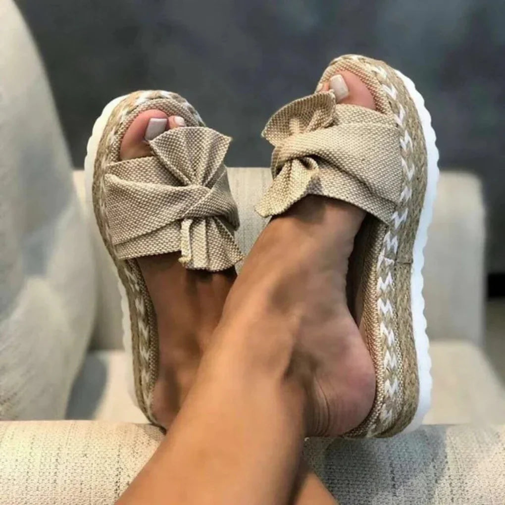 Women's pink bow platform slide sandals, perfect for spring casual wear & comfort