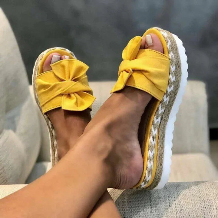 Elegant beige bow platform slide sandals, versatile women's footwear for spring & summer
