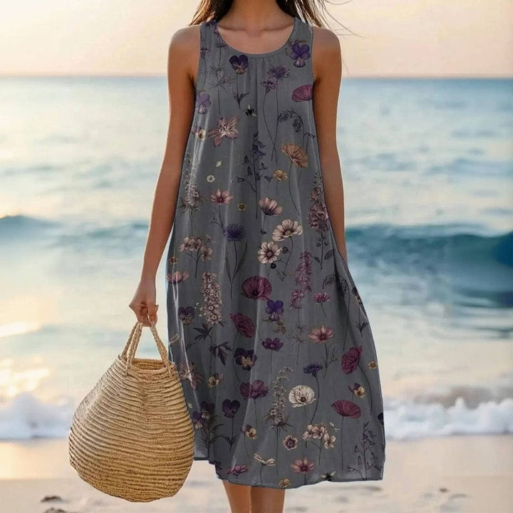 Elegant dark grey floral midi dress for women. Sleeveless, airy fit, perfect as a holiday or summer dress.