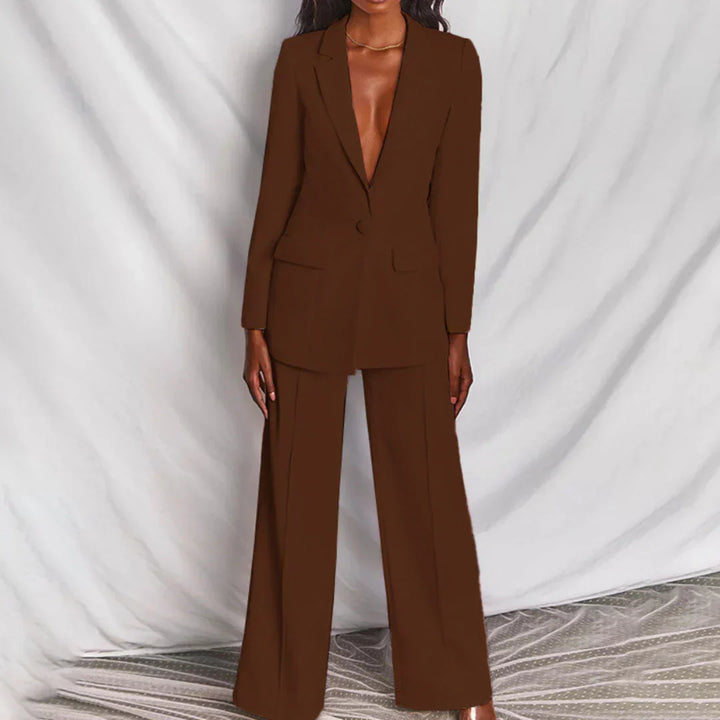 Elegant women's trouser ensemble with a longline blazer, perfect for smart occasions.