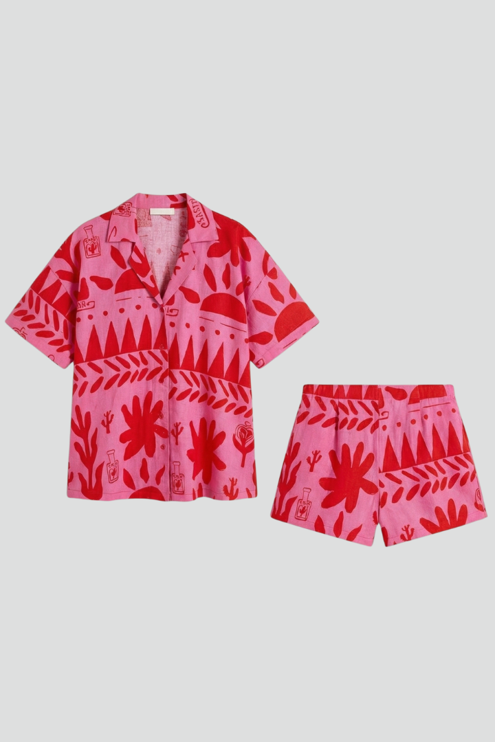 Women's pink two piece shorts set with abstract print, perfect for summer casual wear