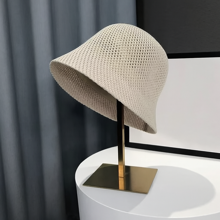 Stylish women's beige UV sun protection bucket hat, perfect for outdoor activities & casual wear.