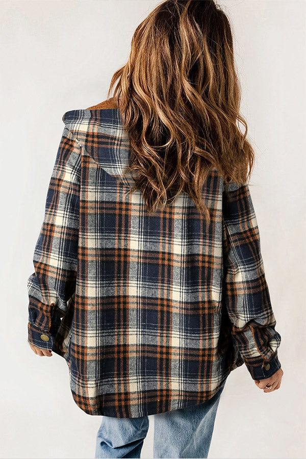 Stylish women's plaid flannel jacket with hood and warm sherpa lining. Perfect for casual wear.