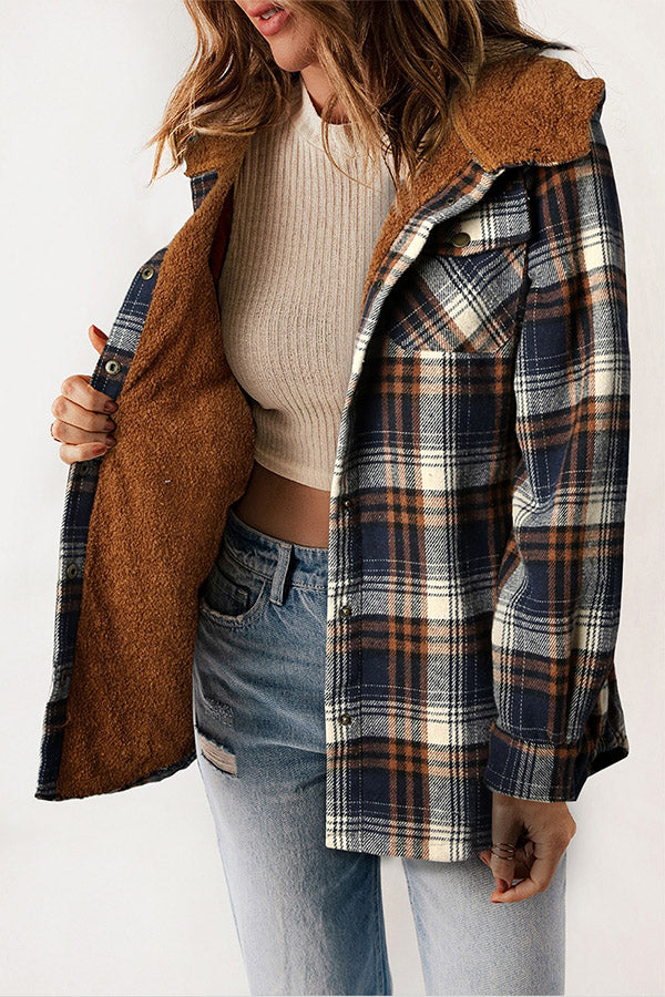 Cozy women's sherpa lined plaid hooded flannel jacket. Button front, long sleeve for warmth.