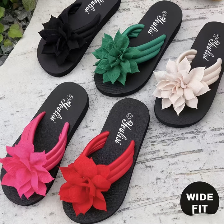 Stylish floral platform flip flops for women, perfect wide fit beach sandals.