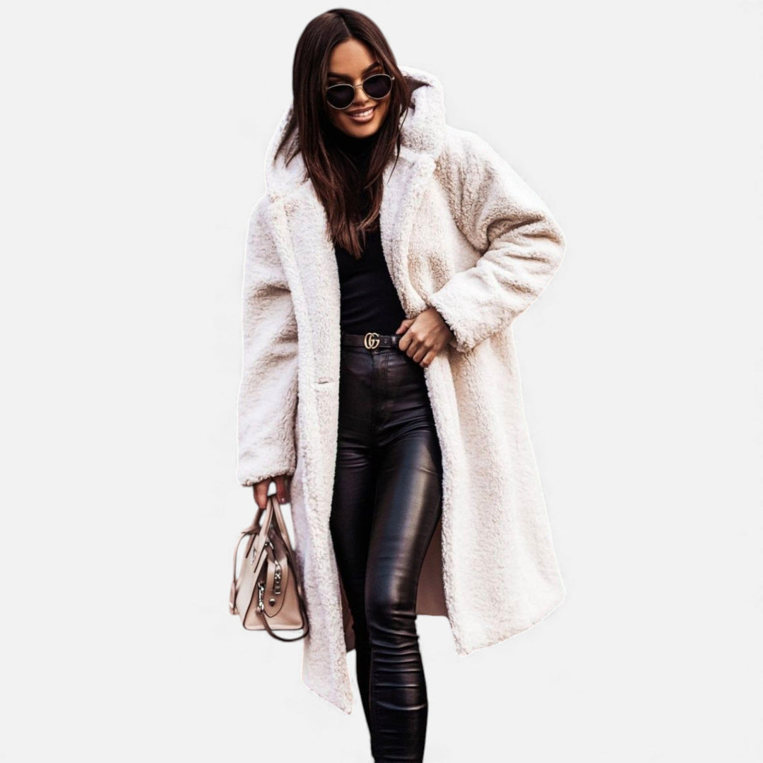 Women's plush longline winter coat for elegant warmth.