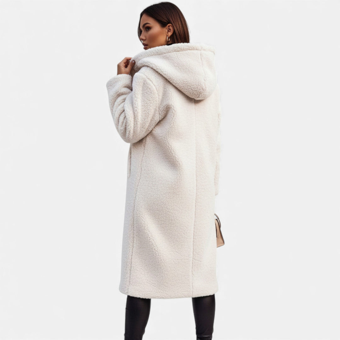 Elegant women's soft plush outerwear, a long winter coat for sophisticated fashion.