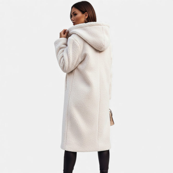 Elegant women's soft plush outerwear, a long winter coat for sophisticated fashion.