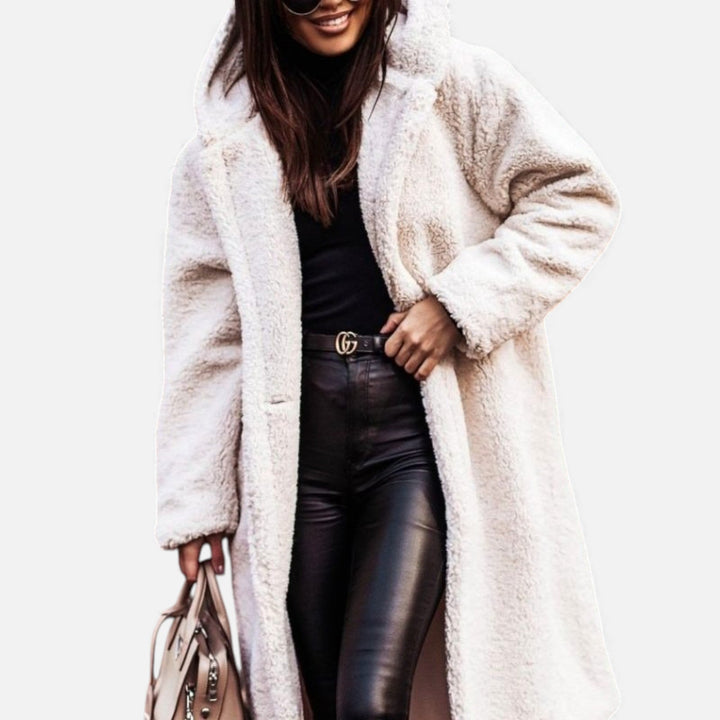 Warm women's long winter coat, plush fabric for ultimate coziness and style.
