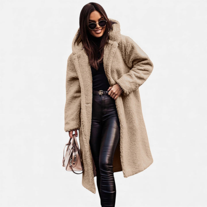 Chic women's plush winter coat, a long, soft outerwear piece for cold weather style.